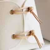 Four replacement leather toggles for large felt bin.
