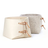 Handcrafted container in pure wool felt with genuine leather toggles